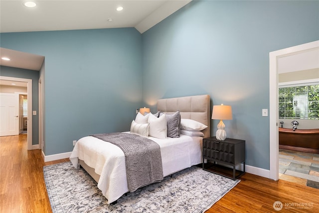 761 Chuckanut Dr, Bellingham, WA 98229 - bedroom featuring lofted ceiling, wood finished floors, recessed lighting, and baseboards