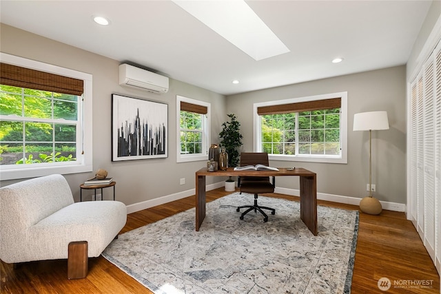 761 Chuckanut Dr, Bellingham, WA 98229 - home office featuring a wall mounted AC, plenty of natural light, baseboards, and recessed lighting
