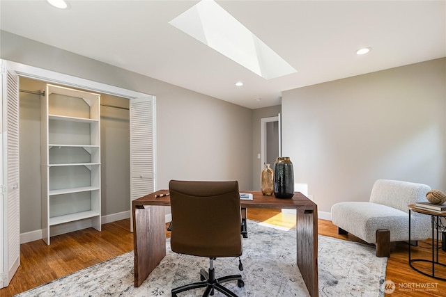 761 Chuckanut Dr, Bellingham, WA 98229 - home office featuring a skylight, wood finished floors, baseboards, and recessed lighting