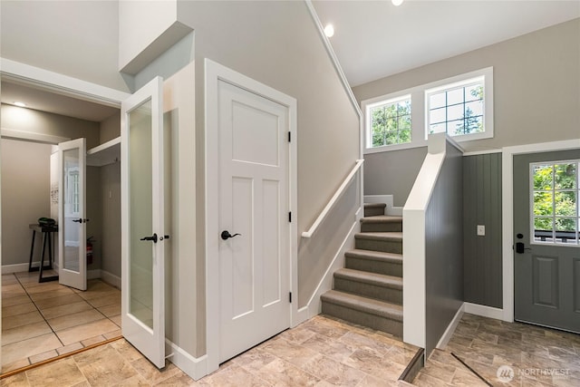 761 Chuckanut Dr, Bellingham, WA 98229 - staircase with french doors and baseboards