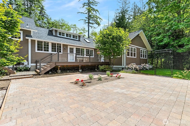 761 Chuckanut Dr, Bellingham, WA 98229 - rear view of property with a wooden deck, a patio, and a shingled roof