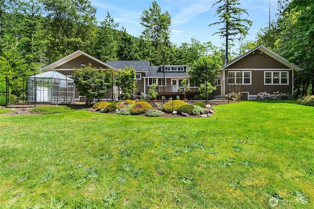 761 Chuckanut Dr, Bellingham, WA 98229 - rear view of property with a lawn and a deck