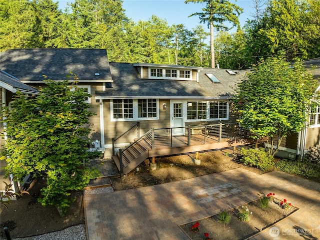 761 Chuckanut Dr, Bellingham, WA 98229 - view of front of property featuring a wooden deck and a shingled roof