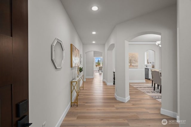 9304 S 223rd Pl, Kent, WA 98031 - hall with arched walkways, recessed lighting, light wood-type flooring, and baseboards