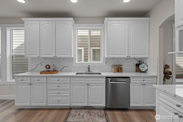 9304 S 223rd Pl, Kent, WA 98031 - kitchen featuring stainless steel dishwasher, a sink, arched walkways, recessed lighting, and dark wood finished floors