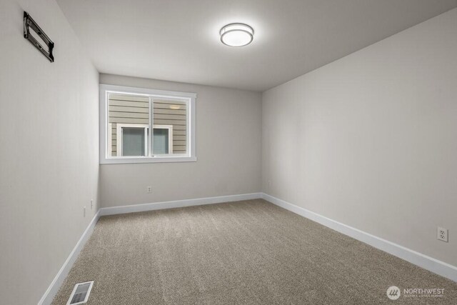 9304 S 223rd Pl, Kent, WA 98031 - carpeted spare room featuring baseboards