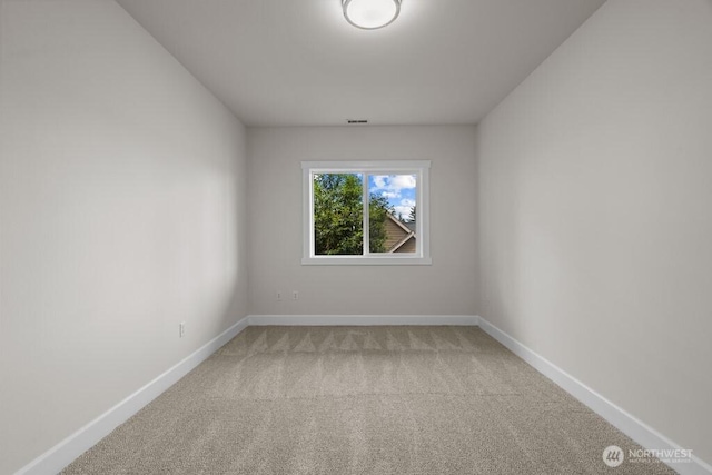 9304 S 223rd Pl, Kent, WA 98031 - unfurnished room featuring light carpet and baseboards