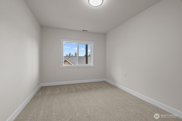 9304 S 223rd Pl, Kent, WA 98031 - spare room with carpet floors and baseboards