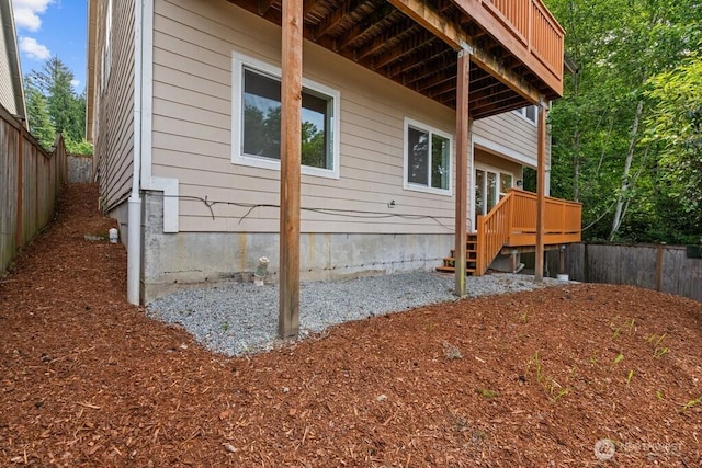 9304 S 223rd Pl, Kent, WA 98031 - view of property exterior featuring a fenced backyard and a wooden deck