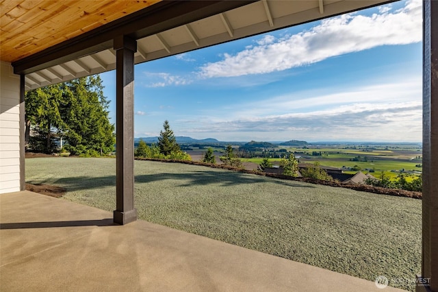 7514 Avalon Heights Way, Sedro Woolley, WA 98284 - view of green lawn featuring a patio area and a mountain view