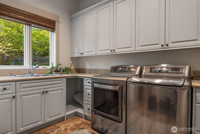 9420 NE 31st St, Clyde Hill, WA 98004 - washroom with cabinet space and washing machine and dryer