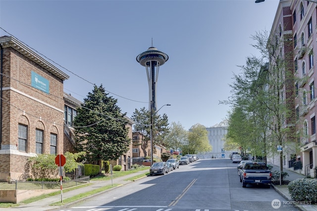 129 Warren Ave N Unit 18, Seattle, WA 98109 - view of asphalt road featuring sidewalks, street lighting, curbs, and traffic signs