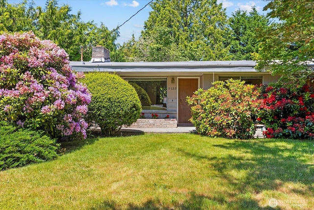 9125 221st St SW, Edmonds, WA 98026 - view of front of house featuring a front lawn and a chimney