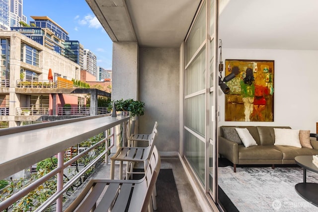 1425 Western Ave Unit L308, Seattle, WA 98101 - balcony featuring a view of city and an outdoor hangout area
