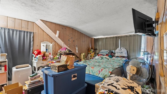 123 NE C St, College Place, WA 99324 - bedroom with a textured ceiling and wood walls
