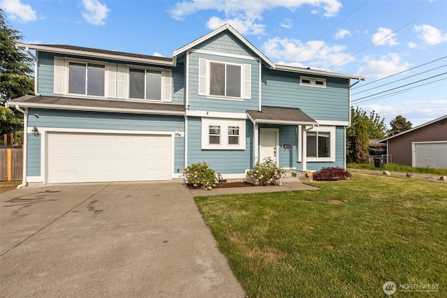 6005 E I St, Tacoma, WA 98404 - view of front facade featuring a garage and concrete driveway