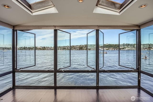 2040 Westlake Ave N Unit 26, Seattle, WA 98109 - unfurnished sunroom featuring a skylight and a water view