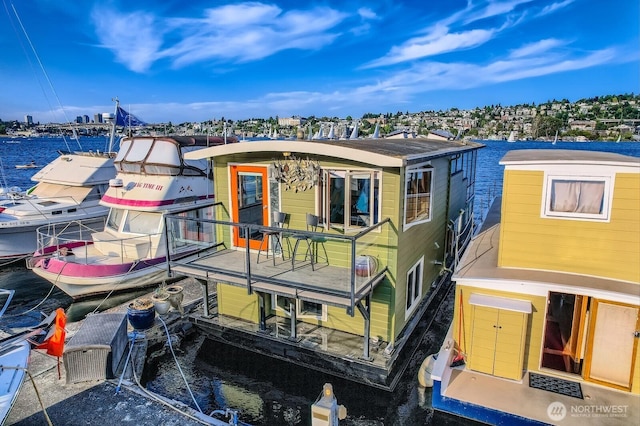 2040 Westlake Ave N Unit 26, Seattle, WA 98109 - view of front facade with a water view and a boat dock