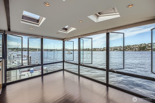 2040 Westlake Ave N Unit 26, Seattle, WA 98109 - unfurnished sunroom with a skylight and a water view