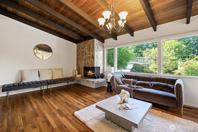 12508 SE 60th St, Bellevue, WA 98006 - living room with wooden ceiling, plenty of natural light, wood finished floors, a fireplace, and a chandelier