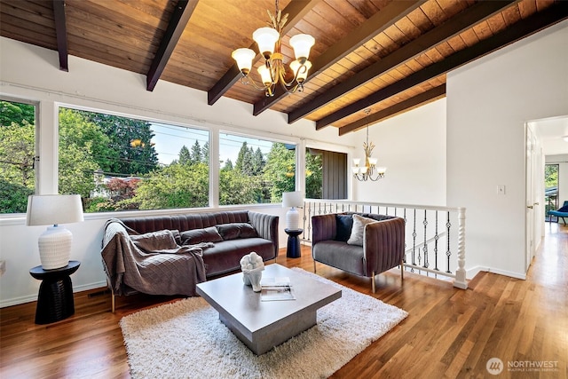 12508 SE 60th St, Bellevue, WA 98006 - living room with a chandelier, wood ceiling, wood finished floors, and baseboards