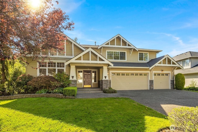 235 249th Pl NE, Sammamish, WA 98074 - view of front of home with stone siding, driveway, a front lawn, and a garage