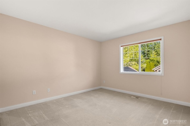 235 249th Pl NE, Sammamish, WA 98074 - unfurnished room featuring baseboards and light carpet