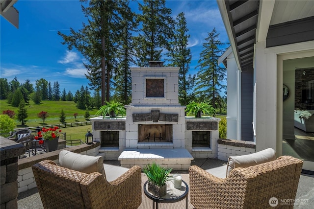 16006 288th St E, Graham, WA 98338 - view of patio featuring an outdoor living space with a fireplace
