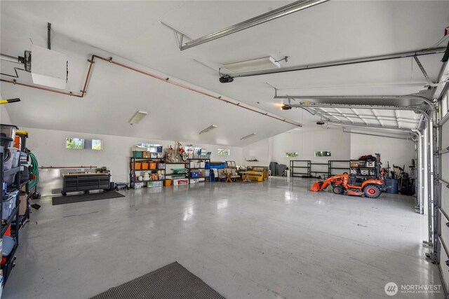 16006 288th St E, Graham, WA 98338 - garage featuring a garage door opener
