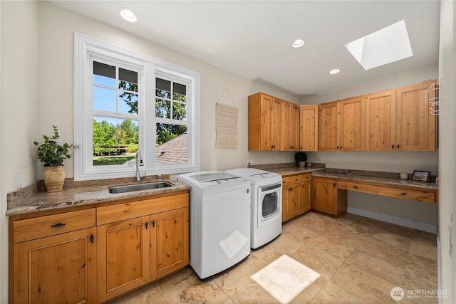 16006 288th St E, Graham, WA 98338 - washroom with a skylight, washing machine and dryer, cabinet space, and recessed lighting