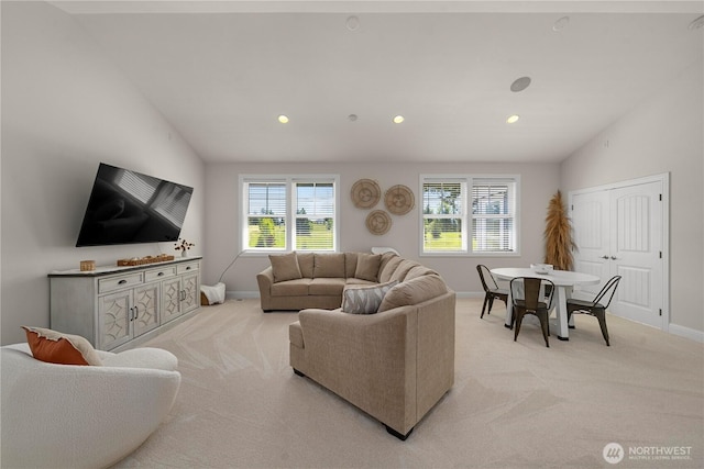 16006 288th St E, Graham, WA 98338 - living room featuring light carpet, baseboards, recessed lighting, and lofted ceiling
