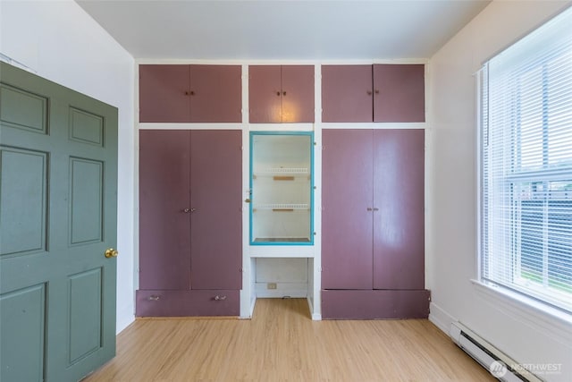 3827 S Morgan St, Seattle, WA 98118 - closet featuring baseboard heating