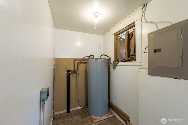 3827 S Morgan St, Seattle, WA 98118 - utility room featuring water heater and electric panel