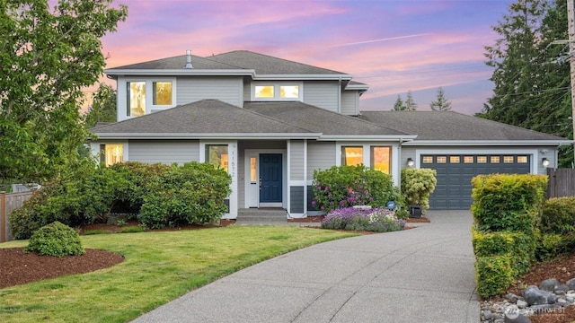 11572 NE Skyward Loop, Kingston, WA 98346 - view of front of home featuring an attached garage, concrete driveway, and a shingled roof