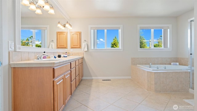 11572 NE Skyward Loop, Kingston, WA 98346 - bathroom featuring a chandelier, double vanity, and healthy amount of natural light