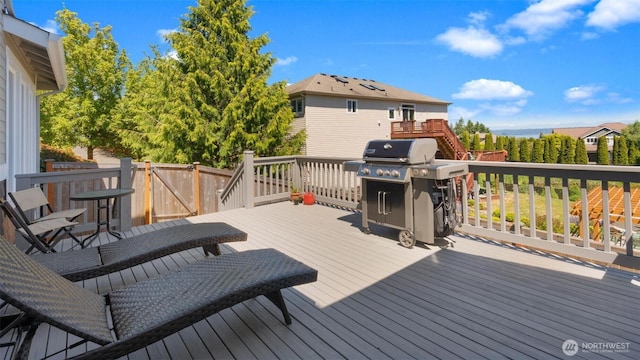 11572 NE Skyward Loop, Kingston, WA 98346 - wooden terrace with area for grilling and stairway