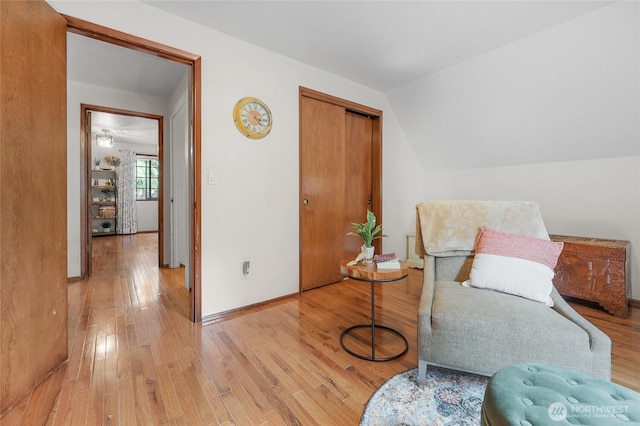 3904 Ridge Way, Mount Vernon, WA 98273 - living area featuring light wood finished floors, lofted ceiling, and baseboards