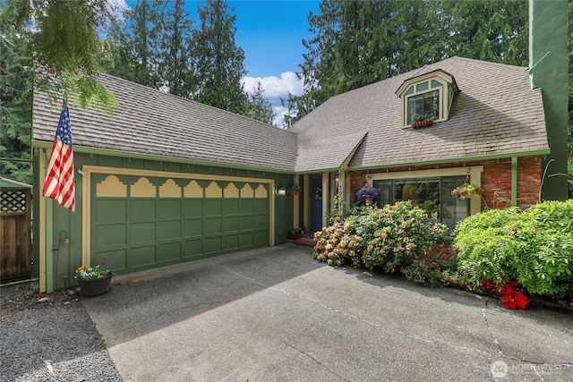 3904 Ridge Way, Mount Vernon, WA 98273 - view of front facade featuring roof with shingles, a garage, and brick siding
