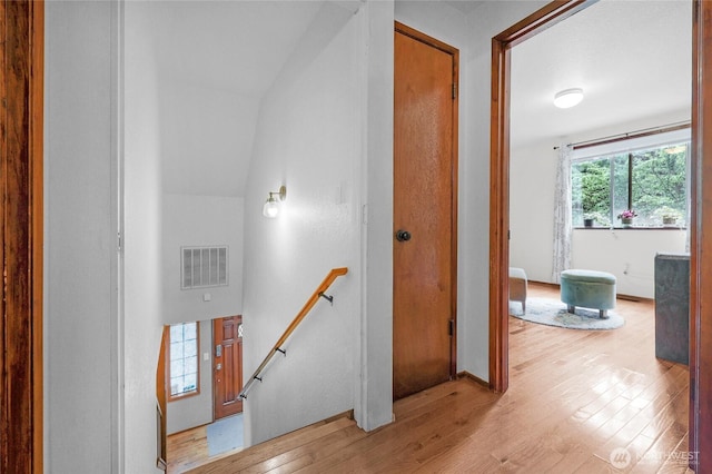 3904 Ridge Way, Mount Vernon, WA 98273 - hallway featuring wood finished floors, an upstairs landing, and baseboards