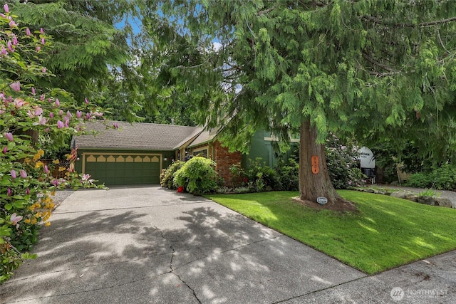 3904 Ridge Way, Mount Vernon, WA 98273 - view of front of property featuring an attached garage, concrete driveway, and a front lawn
