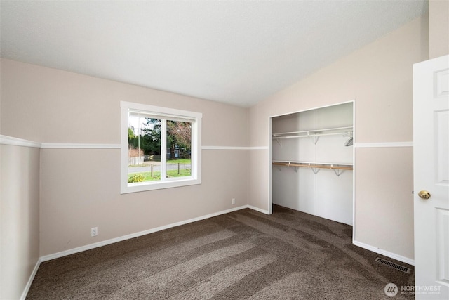 4241 Rural Ave, Bellingham, WA 98226 - unfurnished bedroom featuring lofted ceiling, dark colored carpet, a closet, and baseboards