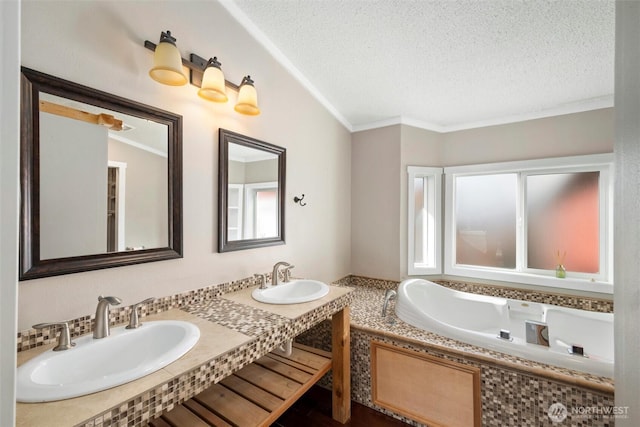 4241 Rural Ave, Bellingham, WA 98226 - bathroom with a textured ceiling, a garden tub, double vanity, and crown molding