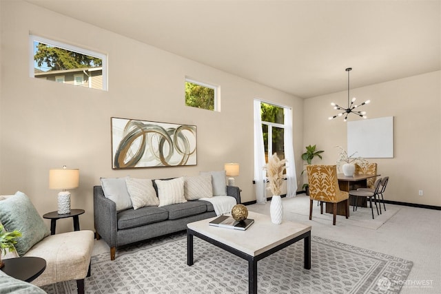18629 44th Ave W, Lynnwood, WA 98037 - living room with a chandelier, light carpet, and baseboards