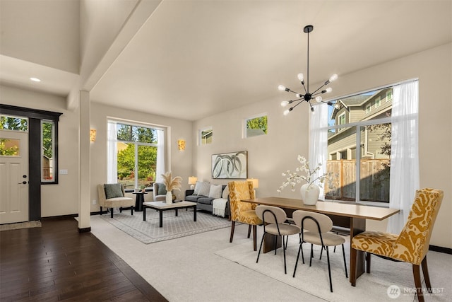18629 44th Ave W, Lynnwood, WA 98037 - living area featuring dark wood-style flooring, a chandelier, and baseboards