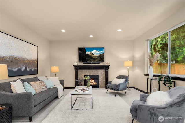 18629 44th Ave W, Lynnwood, WA 98037 - carpeted living room with recessed lighting, a tile fireplace, and baseboards