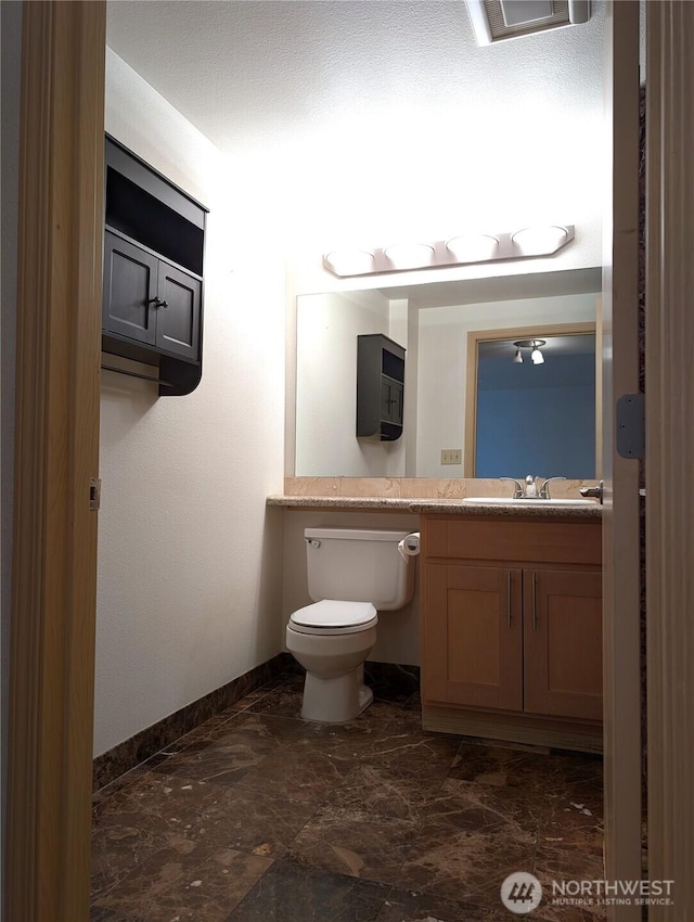 6960 California Ave SW Unit A104, Seattle, WA 98136 - bathroom with vanity and baseboards