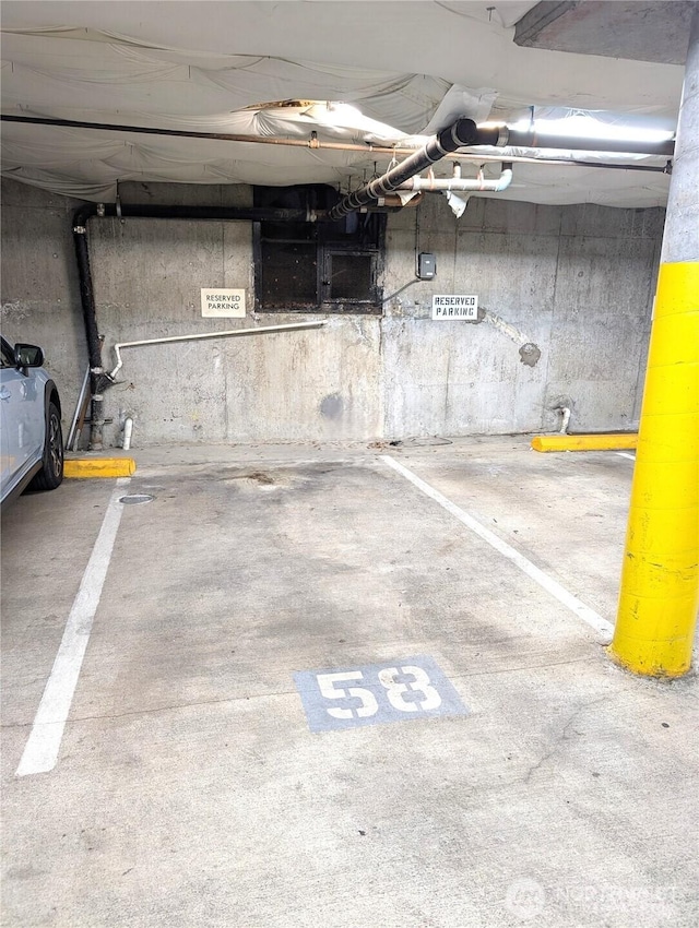 6960 California Ave SW Unit A104, Seattle, WA 98136 - view of parking garage
