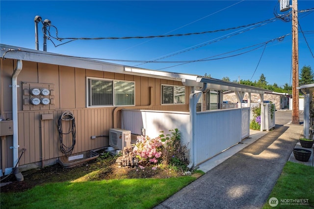 330 7th Pl SE Unit 4, Puyallup, WA 98372 - view of property exterior with a cooling unit