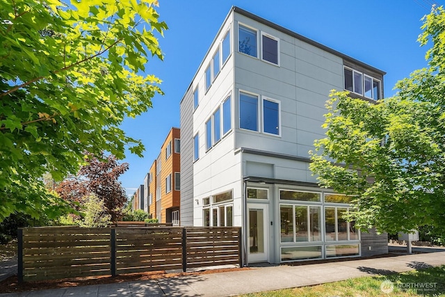 13329 1st Ave NE, Seattle, WA 98125 - rear view of house featuring a fenced front yard