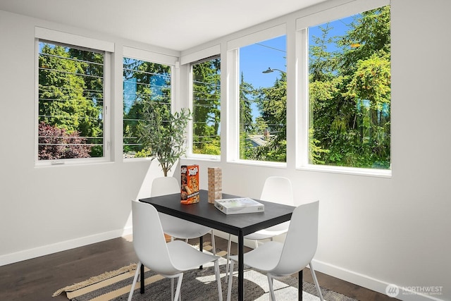 13329 1st Ave NE, Seattle, WA 98125 - dining space with baseboards and wood finished floors